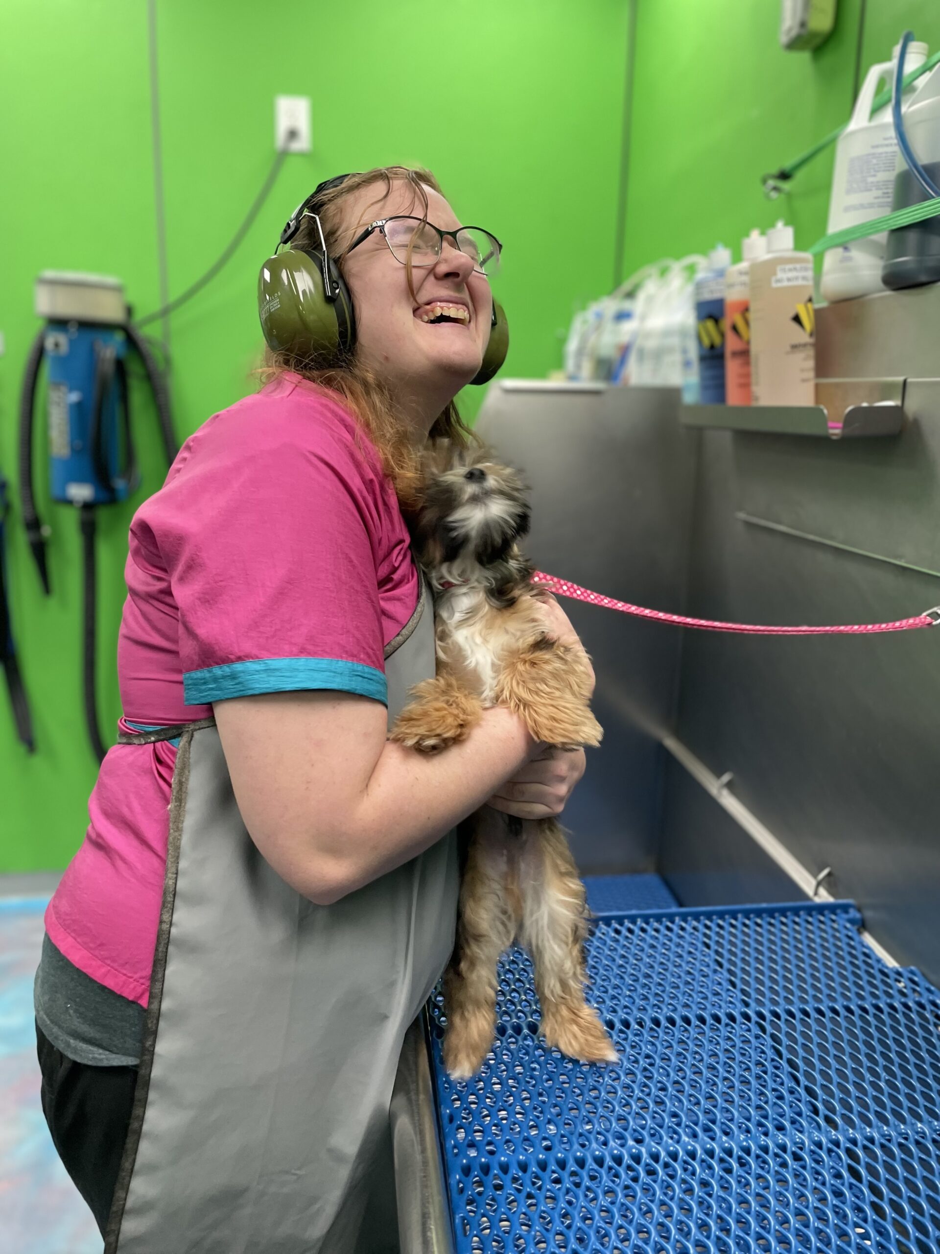 abby and puppy having fun with a bath